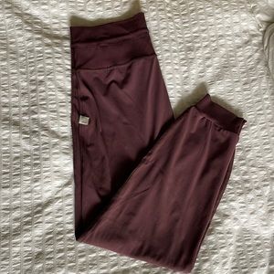 Like new daily jogger color chestnut sz M